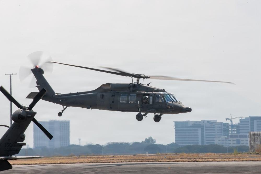 Philippine Air Force S-70i Black Hawk helicopters in flight during bilateral training in April 2026, illustrating the new simulator agreement.
