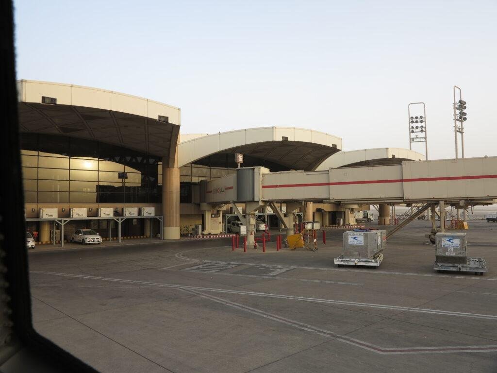 Riyadh airport attacks report illustrated by a 2013 file photo of King Khalid Airport terminal and jet bridges
