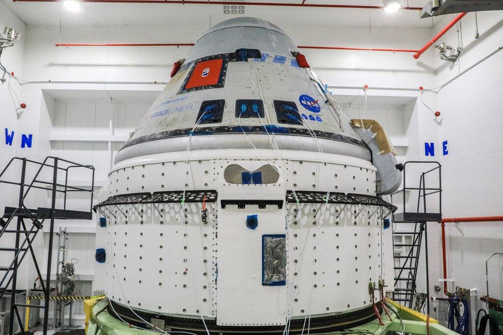 Starliner return to flight spacecraft undergoing preparation and testing at Kennedy Space Center.