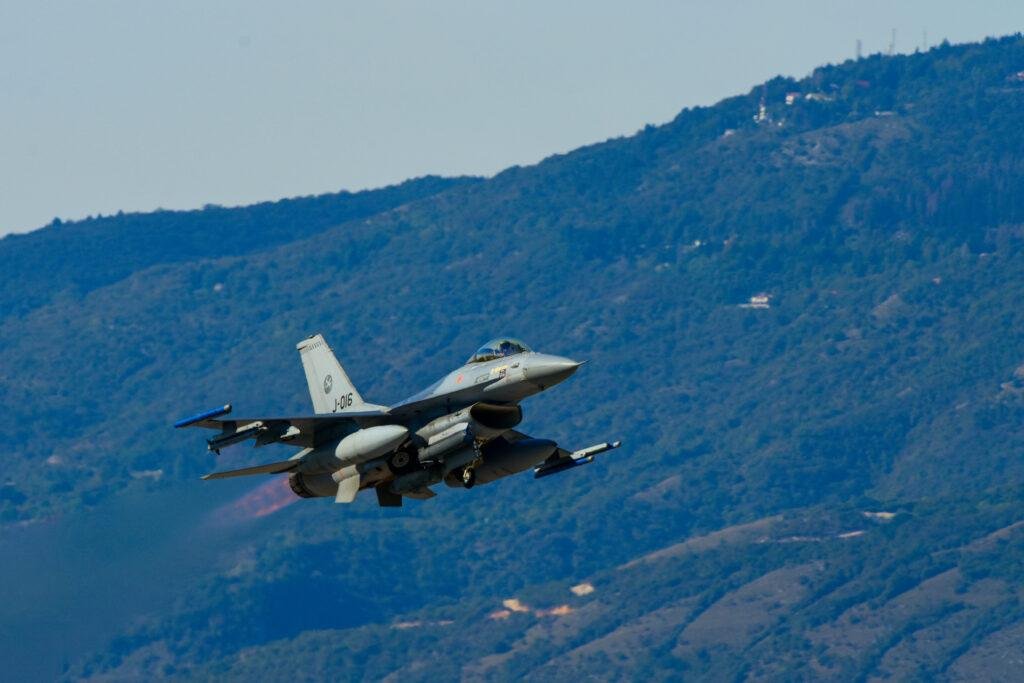 Steadfast Noon exercise illustrated by a U.S. Air Force F-16 Fighting Falcon taking off from an air base in northern Italy during NATO training.