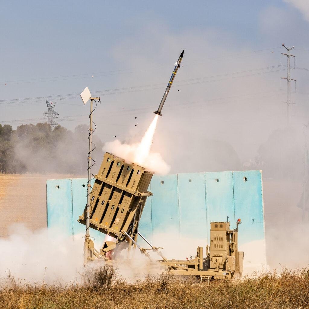 Tamir interceptors used by Israel's Iron Dome air defense system, with one missile launching from a ground-based launcher in 2021.