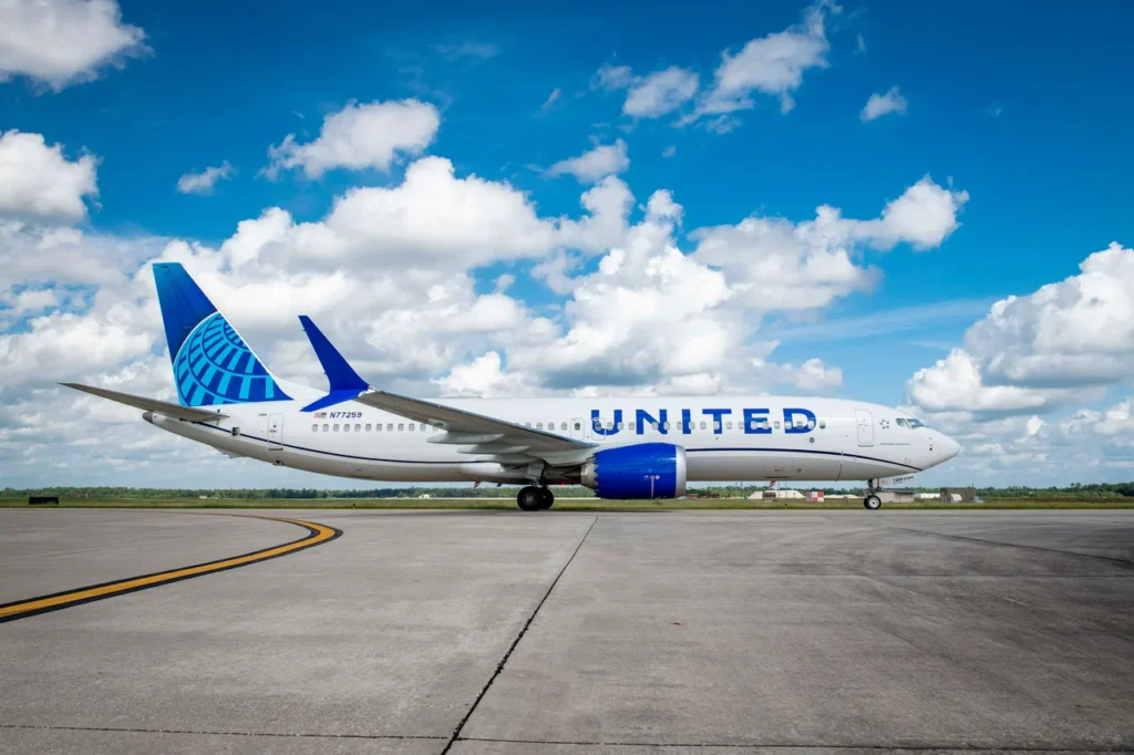 United Starlink Tracker illustrated by a United Airlines Boeing 737 MAX 8 aircraft at Indianapolis International Airport.